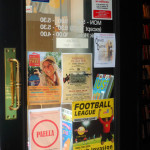 posters for events and clubs in Waterstones bookshop window by Amy Hopwood